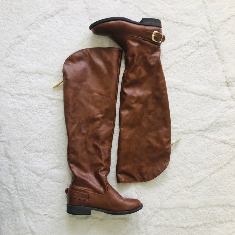 Over the knee riding boots